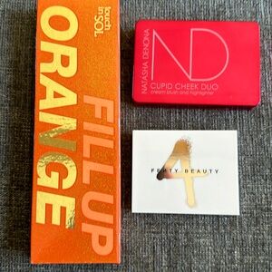 2 eyeshadow palettes and blush palette